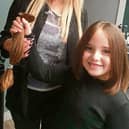 Miah with the  11 inches of  hair she has donated to The Little Princess Trust