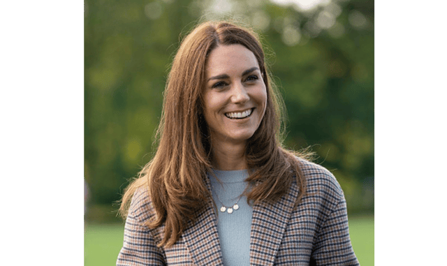 Kate Middleton pictured on Tuesday wearing the personalised gold three layered disc necklace, engraved with the initials of each of Kate and William’s children