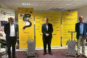 Limerick TD Kieran O'Donnell pictured at CW, flanked by company chief executive John O'Donnell and development manager Paul Hackett