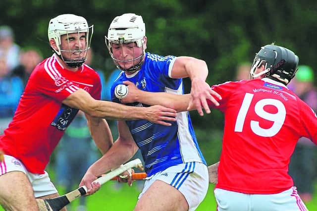 Kyle Hayes looks to break past the challenges of Rory Duff and Kieran O'Dowd in the round one tie