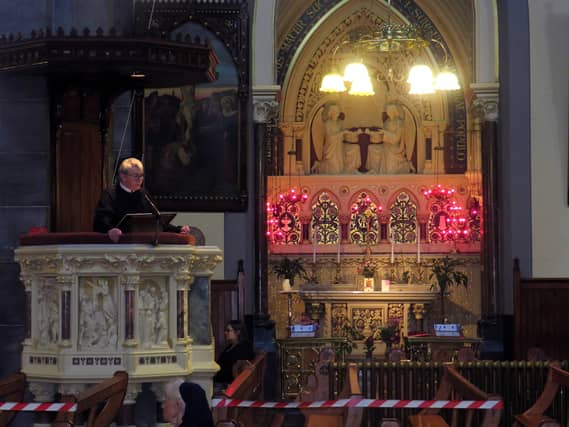 Fr Gerry Moloney, pictured giving his homily on Friday, said 'Covid-19 has been that rare plague that has affected everyone in some way'
