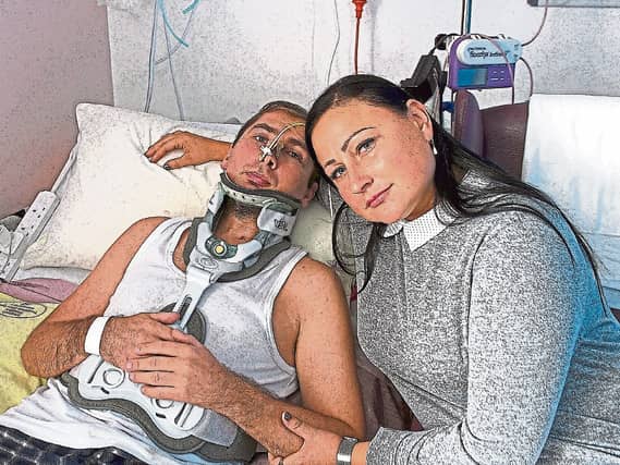 Tomas Mikalajunas with his wife Gintare Mikalajuniene at UHL following the shooting incident near Shanagolden in 2016 - PICTURE: Michael Cowhey