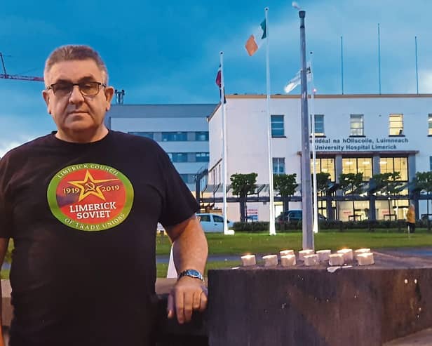 Limerick Trades Council president lit candles outside University Hospital Limerick as part of workers memorial day