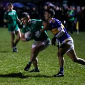 Limerick's Rory O'Brien attempts to break past this Tipperary challenge