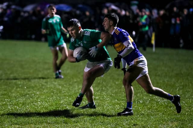 Limerick's Rory O'Brien attempts to break past this Tipperary challenge