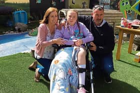 TV Show DIY SOS is appealing to Limerick tradespeople to volunteer their services and build an extension for Amy, pictured with parents Sharon and Mark