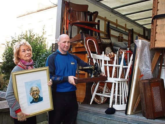 Una Heaton and Mike Lynch, from Smart Movers, loading the museum exhibits on to a truck - Picture: Adrian Butler