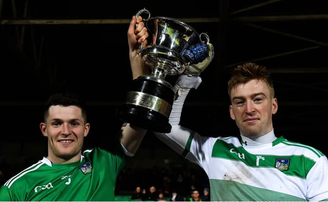 Limerick joint captains Iain Corbett, left, and Donal O'Sullivan lift the cup after the McGrath Cup final win over Cork at the LIT Gaelic Grounds on Saturday night