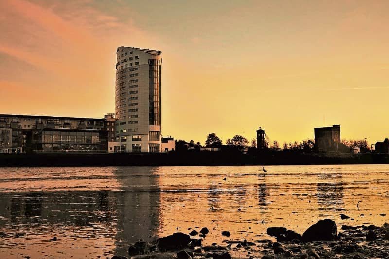 Claire Waters shot of the Shannon with the Clayton Hotel in the background