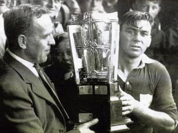 Success breeds success: The famous photo of Mick Mackey with the Liam MacCarthy Cup in 1940