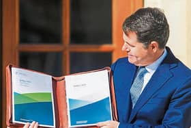 Finance Minister Pascal Donohoe proudly displaying his work