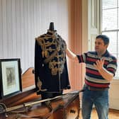 John Power examining one  of the exhibits commemorating lost Irish soldiers in the First World War