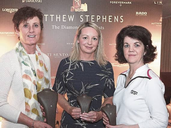 Mary Ryan on behalf of the sponsors presents fourth prize in the Matthew Stephens Jewellers Competition to Mary Conlon (left) and Ann O'Mahony at a prize giving evening in Limerick Golf Club Pic