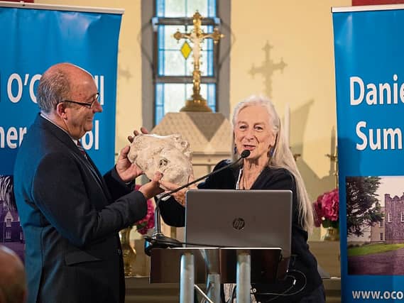 Lady Geraldine Dunraven passing Daniel O'Connell's death mask to Maurice Buckley, chairman of the OPW