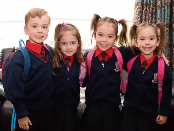 The Slattery Quads first day at Caherline national school - Lucas, Lily, Amelia and Mollie Picture: Michael Cowhey