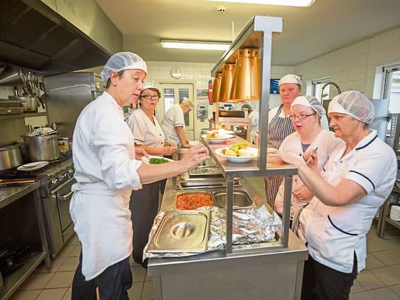 Rachel Duff, left, is the woman behind the nutritious meals, along with her kitchen team