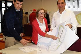 Cllrs Frankie Daly and James Collins with Deputy Jan O'Sullivan perusing the plans