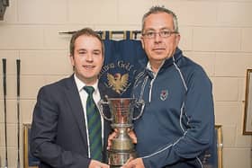 Vincent Scully, of Captain Shannon Golf Club,  presents winner  Pat Murray with the Senior Scratch Cup Picture: Joe Buckley