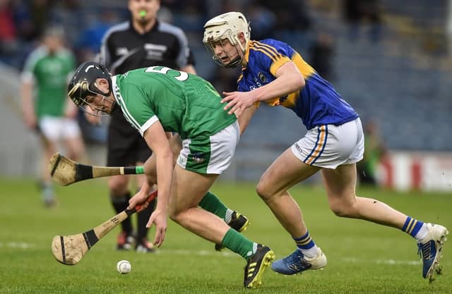Mikey O'Brien in action against Bryan O'Mara of Tipperary during the 2017 Munster MHC