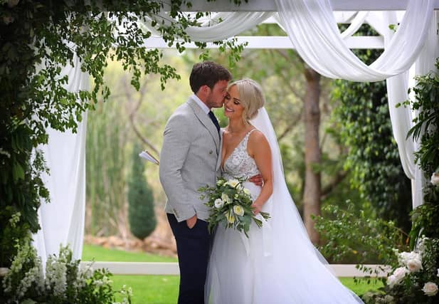 Leanne and husband David pose following their nuptials Photo: Dermot Culhane