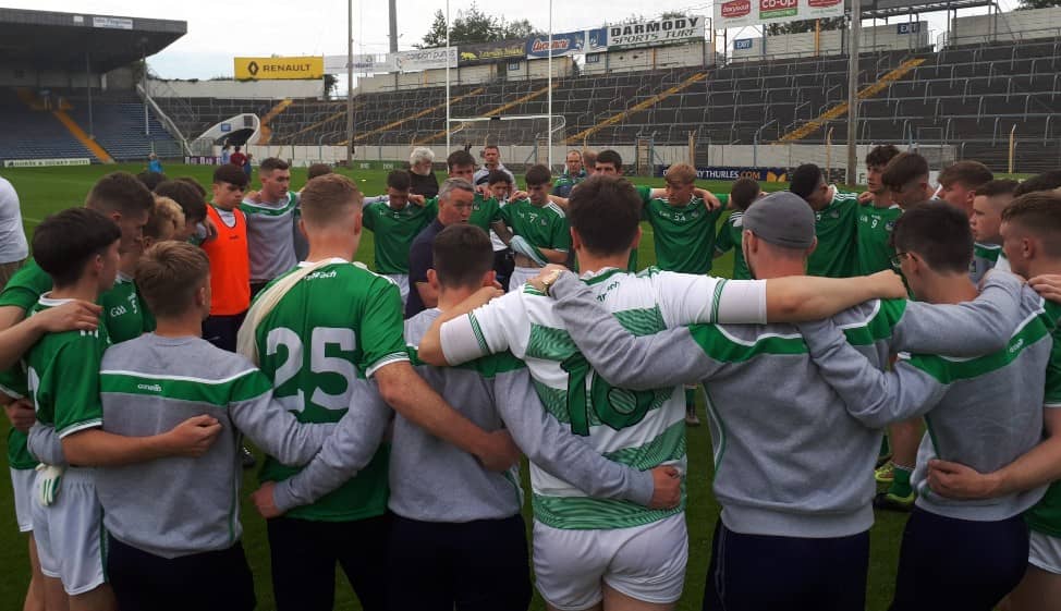 Limerick manager Jerry O'Sullivan talks to his players after the Tipperary win in Thurles