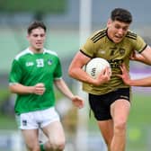 Joseph O'Connor of Kerry is tackled by Jack Fitzgerald of Limerick in Tralee