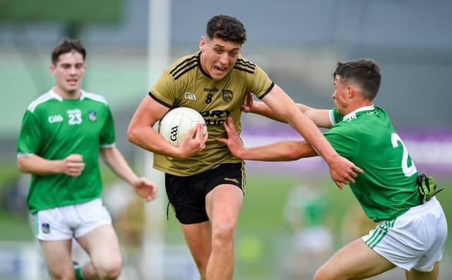 Joseph O'Connor of Kerry is tackled by Jack Fitzgerald of Limerick in Tralee