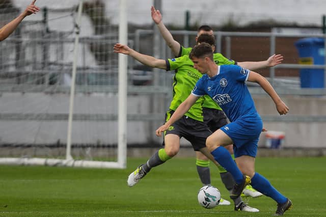 Limerick's Sean McSweeney looks to shoot past the Drogheda defenders