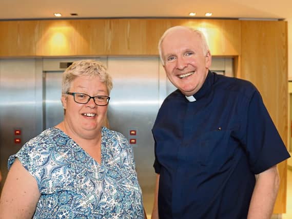 Marguerite Quinn posing with Bishop Brendan Leahy on the pilgrimage to Lourdes
