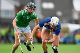 Constant pressure: Seán O'Brien of Tipperary in action against Graeme Mulcahy of Limerick during the Munster GAA Hurling Senior Championship Final