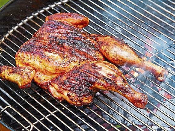Vegetarians look away: Butterflied chicken goes great on the summer BBQ grill