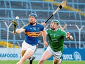 Limerick's Sean Finn pursues Tipperary's Jason Forde in a previous Munster senior hurling championship meeting between the counties