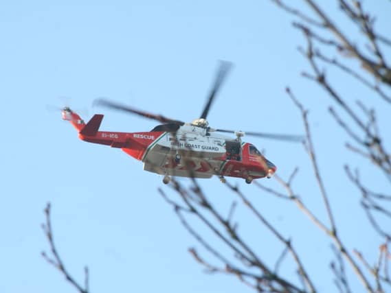 Rescue Helicopter 115 was unable to land due to the rough terrain, but ferried search crews close to the site