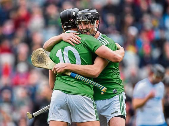 Limerick players Diarmaid Byrnes, right, and Gearóid Hegarty celebrate after the Allianz Hurling League Division 1 Final match between Limerick and Waterford at Croke Park Picture: Piaras Ó Mídheach/S
