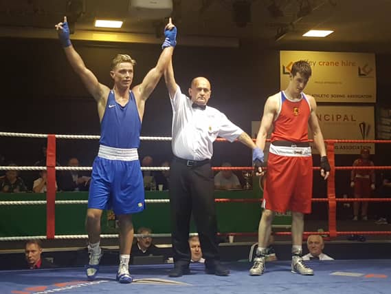 Paddy Donovan has his hand raised in victory in National U/22 final last Friday
