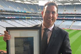 Knockainey man Brian O’Callaghan with a business all-star award he won in Croke Park
