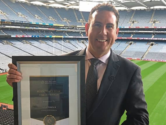 Knockainey man Brian O’Callaghan with a business all-star award he won in Croke Park