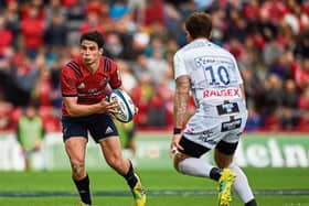 Munster's Joey Carbery attempts to get by Danny Cipriani when the sides met in round two