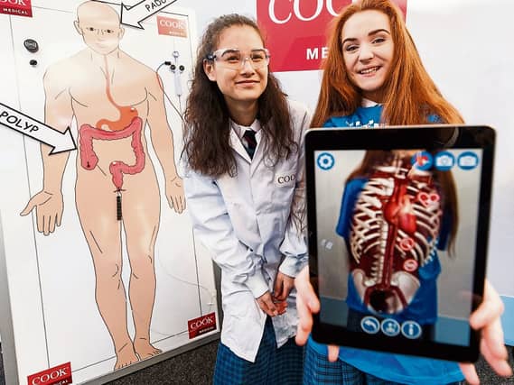 Orla Mullane and Emma O'Shea of Desmond College Limerick at the Cook Medical stand of the BT Young Scientist and Technology Exhibition Picture: Andres Poveda
