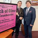 Nicky Woulfe presents Mayor James Collins with a poster to mark Dolores O'Riordan's anniversary Picture: Brendan Gleeson