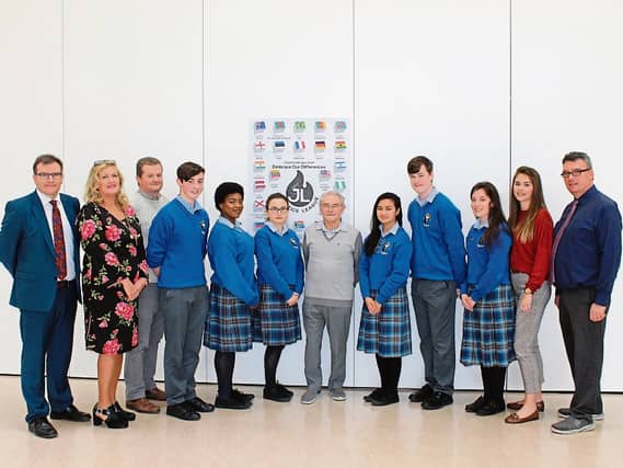 Tomi Reichental unveils a poster highlighting Diversity in Colaiste Ide agus Iosef, Abbeyfeale