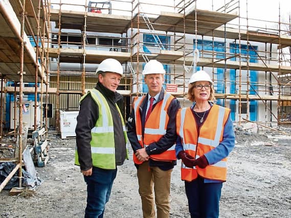 Michael O'Sullivan of Conack Construction, St Paul's National School principal John Tuohy and Jan O'Sullivan, TD on the site Picture: Adrian Butler