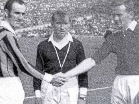 Referee Sean O'Connor with captains Eddie Keher of Kilkenny and Cork's Denis Muprhy ahead of the 1969 All Ireland SHC final