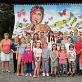 Contributors gathered at the mural for Dolores O’Riordan at Connolly Cross petrol station in Caherline Picture Michael Cowhey