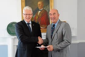 Brian Harrington, the chairperson of the Irish Hotels Federation’s, Shannon Branch presents a cheque to David O'Brien, Limerick Civic Trust Picture: Paul Mullins