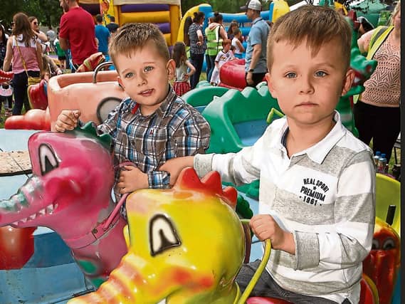 Brothers in fun, Kai and Max Siberman from Newcastle West enjoying last year’s Rathfredagh Garden Fete Picture: Dave Gaynor