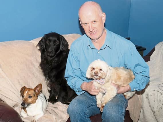 James Broderick at home with his three of his four dogs | PICTURE: Michael Cowhey