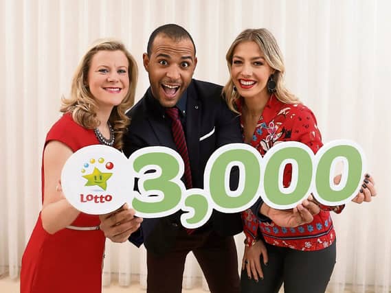 Limerick Lotto presenter Kamal Ibrahim, centre, with fellow presenters Bláthnaid Treacy and Nuala Carey ahead of the milestone 3,000th draw Picture: Mac Innes Photography