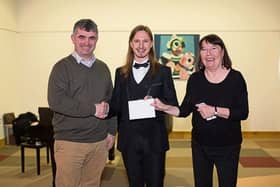 Councillor Richard O’Donoghue and Chairperson Norma Prendiville award the Christopher Lynch Singing Bursary to Kevin Neville at the Rathkeale Community Arts Centre