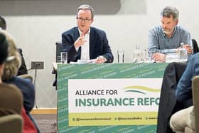 Peter Boland and Eoin McCambridge of the Alliance for Insurance Reform pictured at the public meeting at the Strand Hotel Picture: Don Moloney
